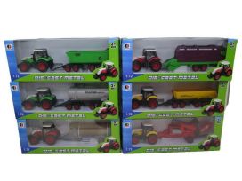 Metallinen traktori peräkärryllä